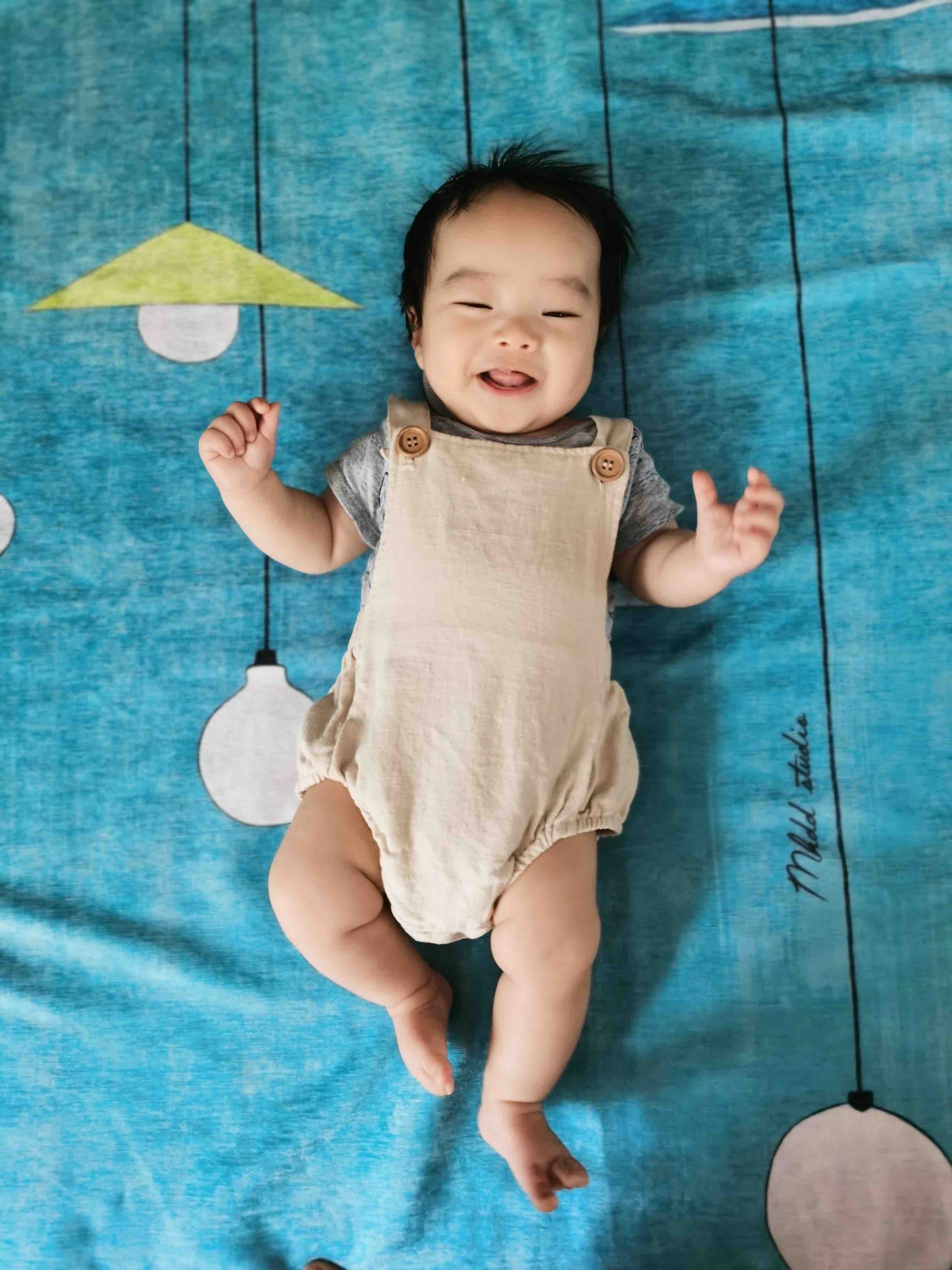 A photo of Coaca Bean smiling.