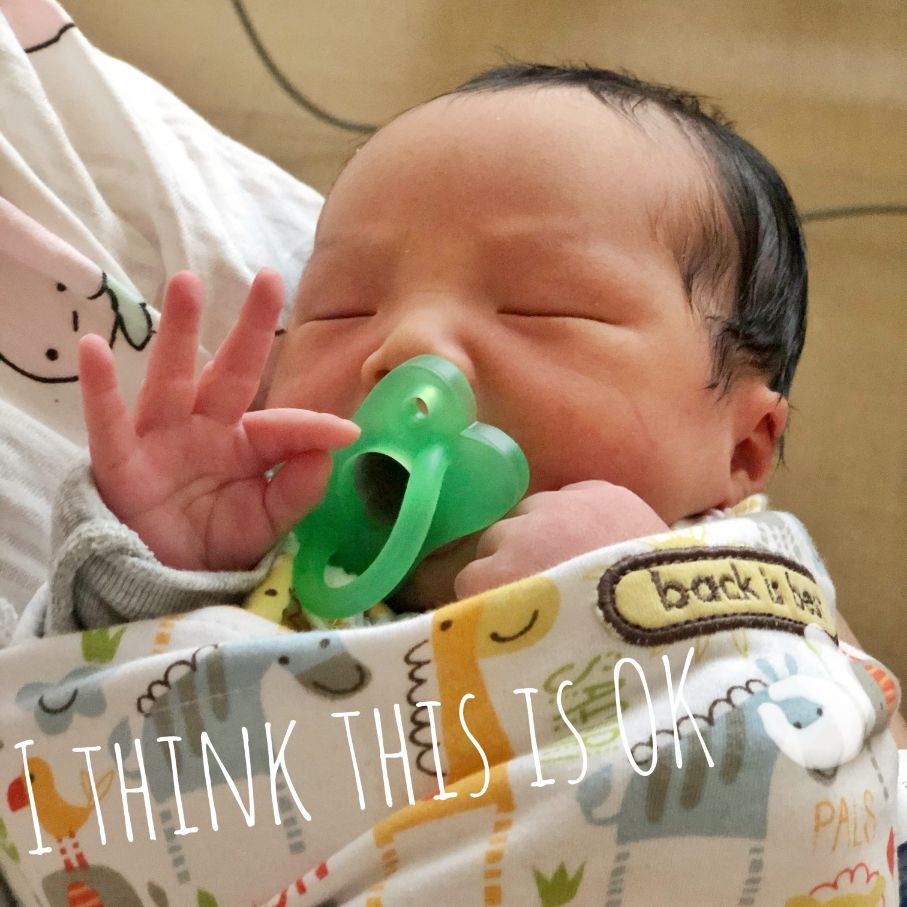 A photo of Coaca Bean making an 'OK' gesture.