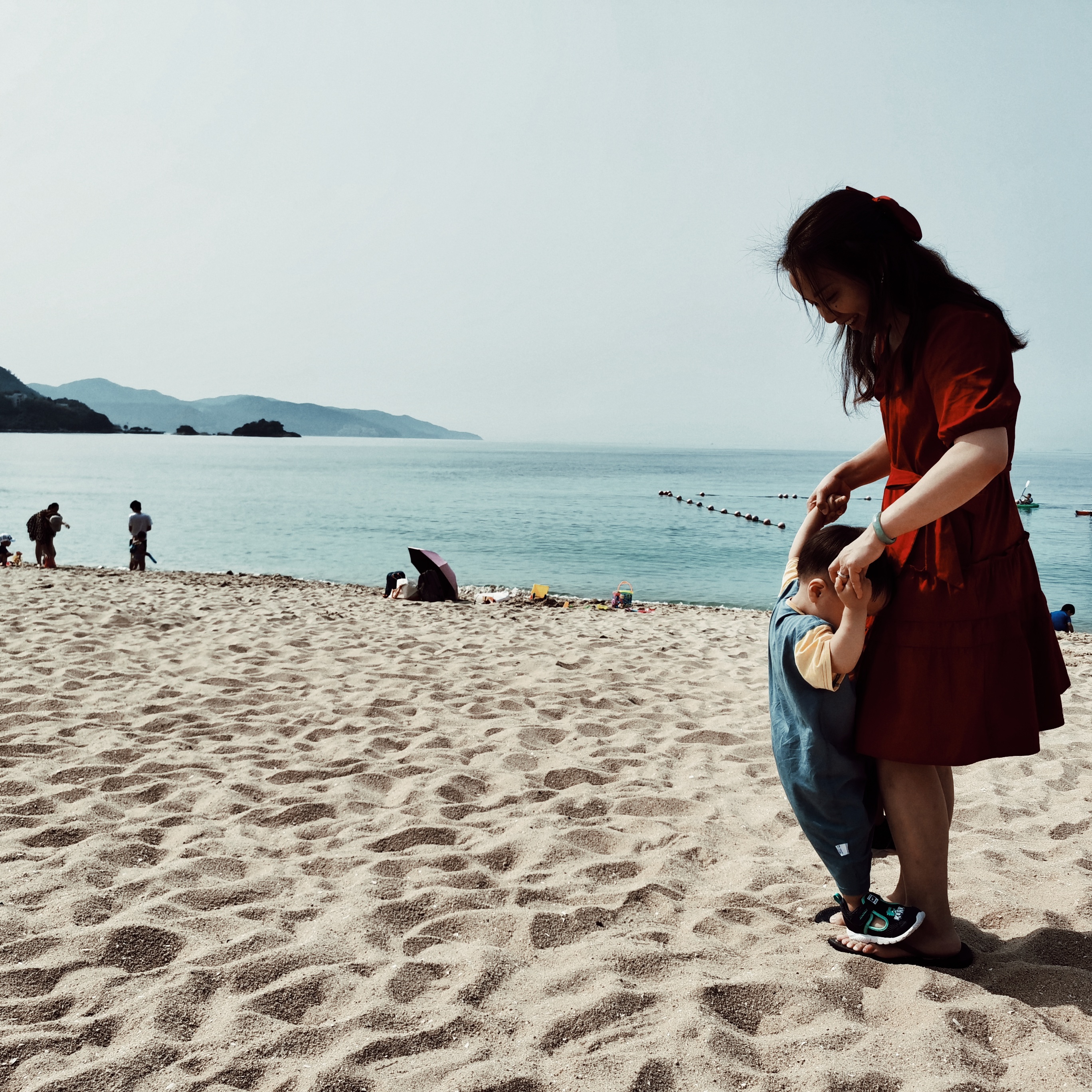 Cocoa Bean is playing at the beach.