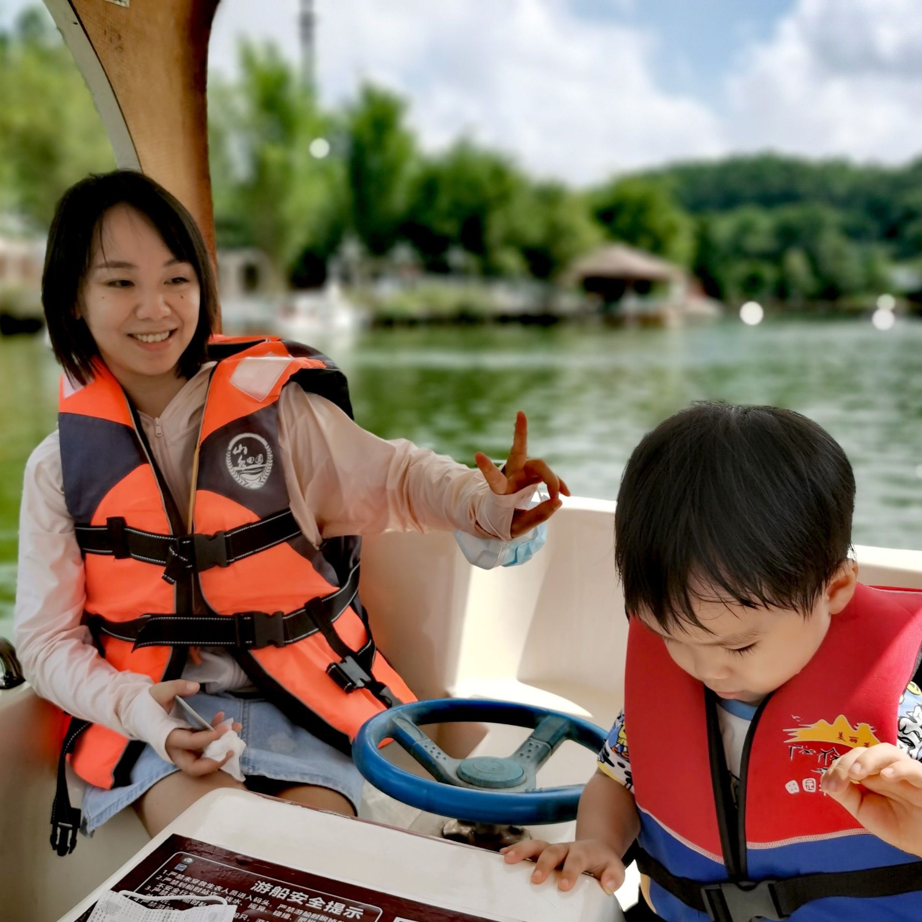 Cocoa Bean is rowing a boat.