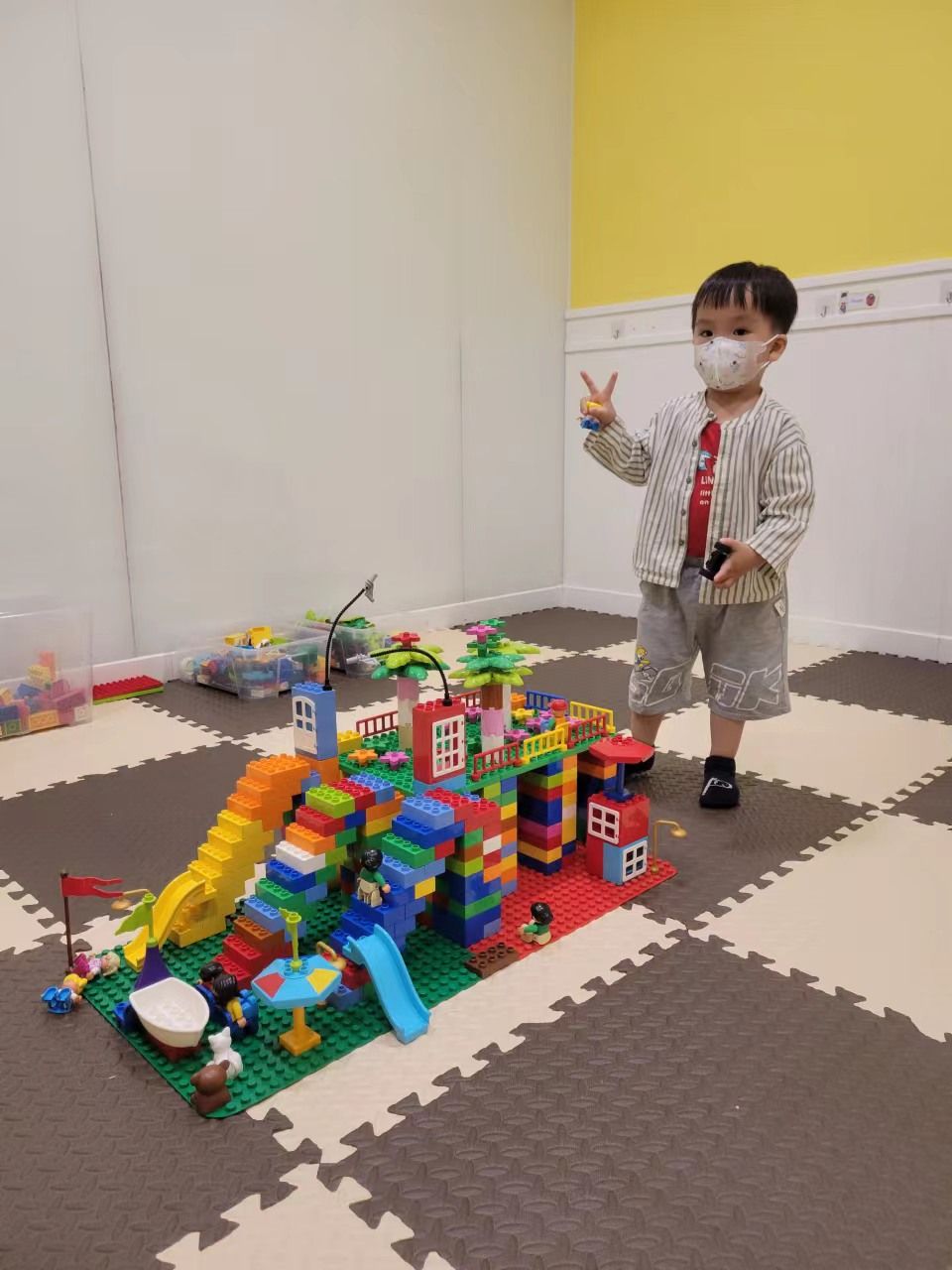 Cocoa Bean is playing with lego.