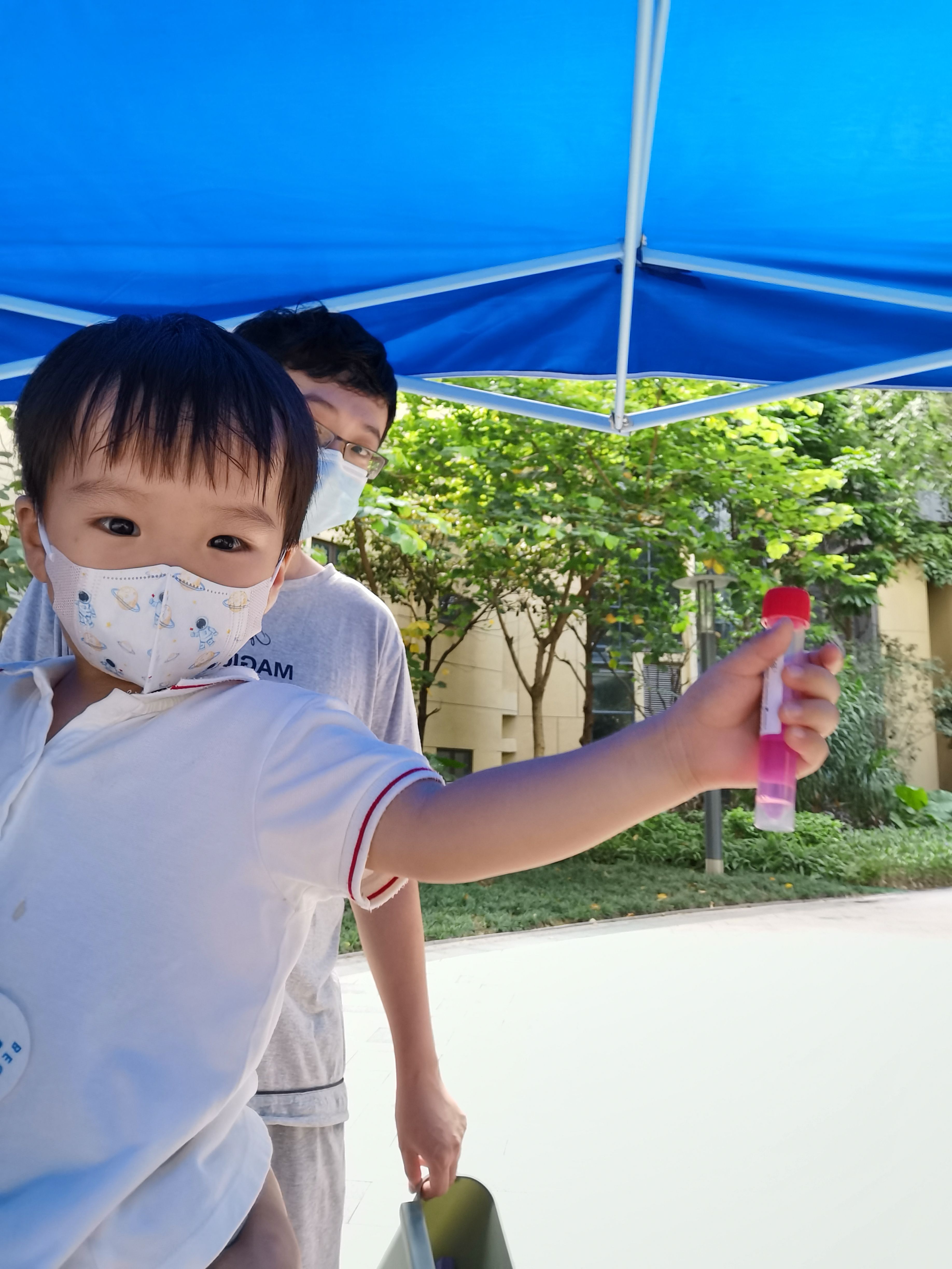 Cocoa Bean is taking a COVID test.